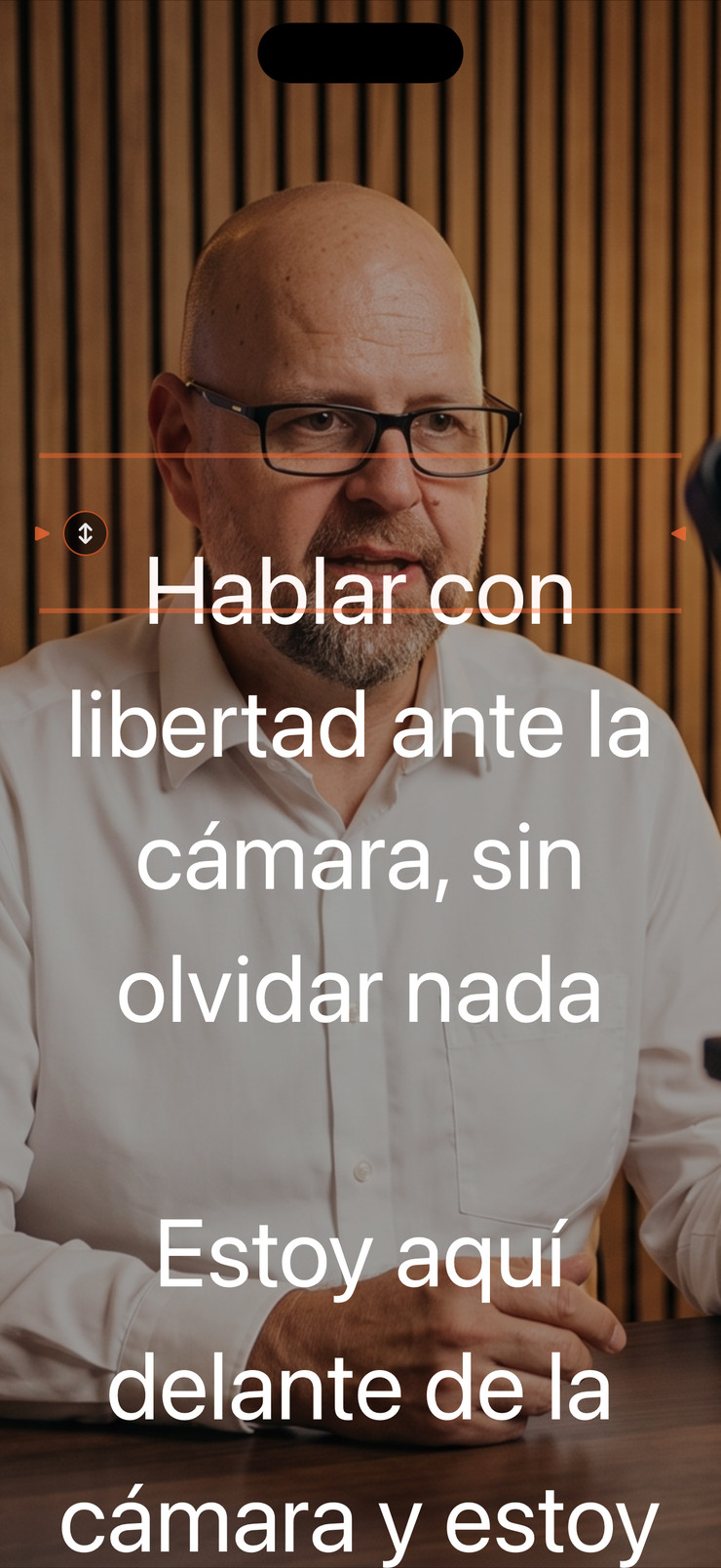 Teleprónter de iPhone con texto en español sobre una imagen de cámara